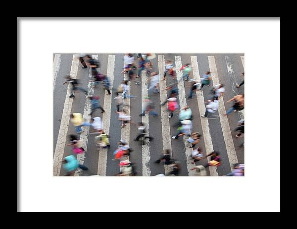 Scenics Framed Print featuring the photograph Birds Eye View Of Blurred Busy Crosswalk by Brasil2