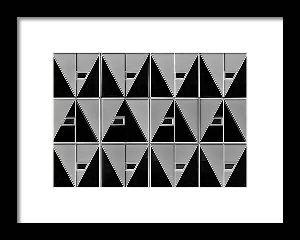 Black Framed Print featuring the photograph Black And Grey Triangles by Theo Luycx