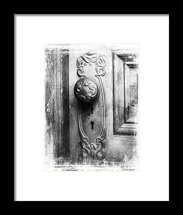 Door Knob Framed Print featuring the photograph Black and White Distressed Door Knob by Melissa Bittinger