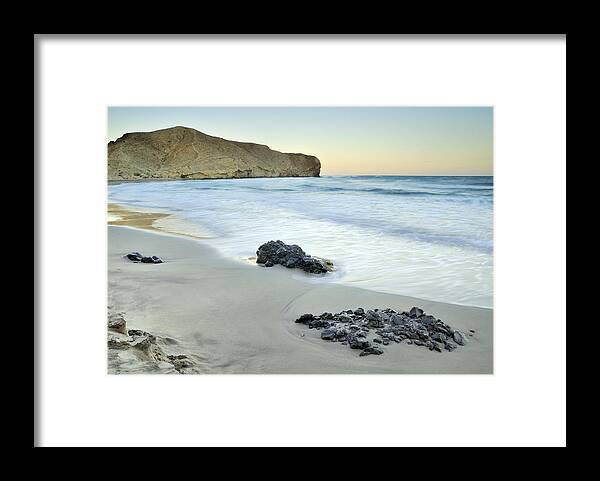 Seascape Framed Print featuring the photograph Black volcanic rocks by Guido Montanes Castillo