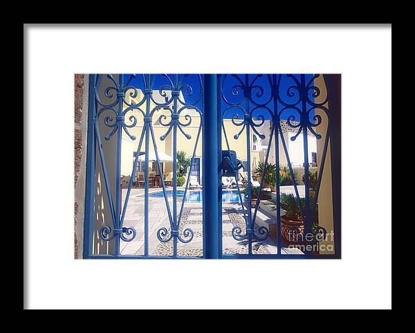 Santorini Framed Print featuring the photograph Blue gate by Aiolos Greek Collections