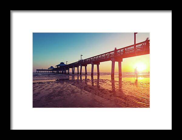 Water's Edge Framed Print featuring the photograph Boardwalk At Sunset While The Sun by Moreiso