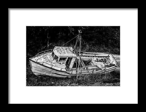Boat Graveyard Framed Print featuring the photograph Boat Graveyard by Patrick Boening