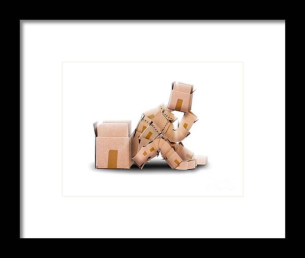 Box Framed Print featuring the photograph Box character sat thinking by Simon Bratt