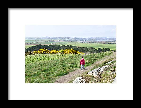 Adventure Framed Print featuring the photograph Boy walking by Tom Gowanlock