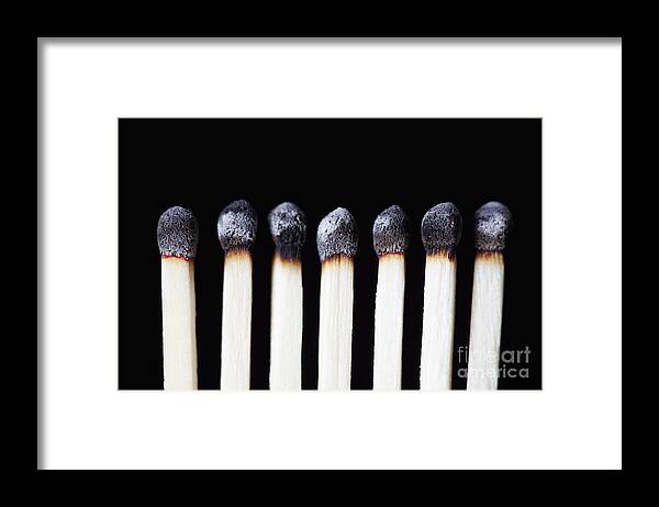Matches Framed Print featuring the photograph Burnt Matches on Black by Bryan Mullennix