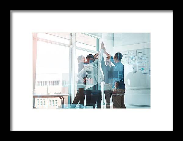 New Business Framed Print featuring the photograph Business is winning when we stick together by Cecilie_Arcurs