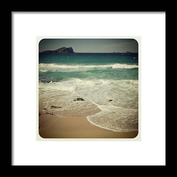 Water's Edge Framed Print featuring the photograph Cala Comte Beach. Ibiza, Spain by Rachel Carbonell