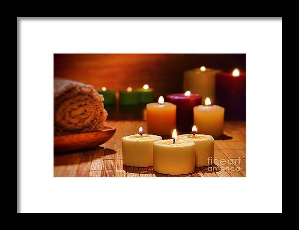 Candles Framed Print featuring the photograph Candles Burning in a Spa by Olivier Le Queinec