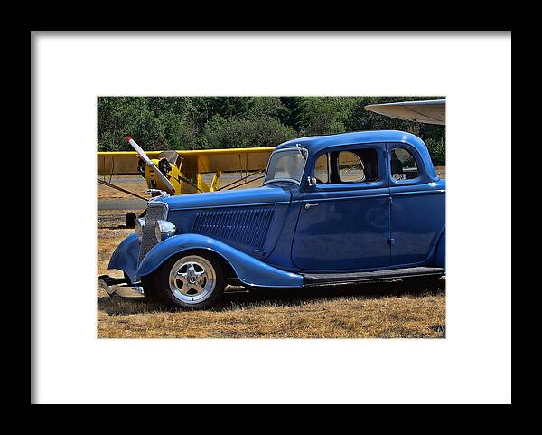 Blue Car Framed Print featuring the photograph Car and Plane by Ron Roberts