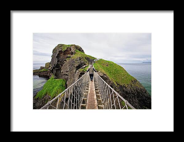 Mature Adult Framed Print featuring the photograph Carrick-a-rede Rope Bridge, Co. Antrim by David Soanes Photography