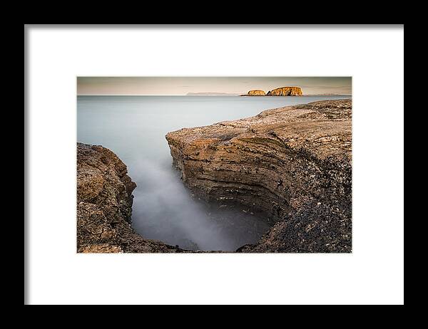 Sheep Island Framed Print featuring the photograph Carved by the Sea - Ballintoy by Nigel R Bell