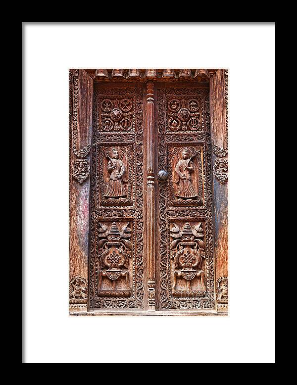 Bhaktapur Framed Print featuring the photograph Carved wooden door at Bhaktapur in Nepal by Robert Preston