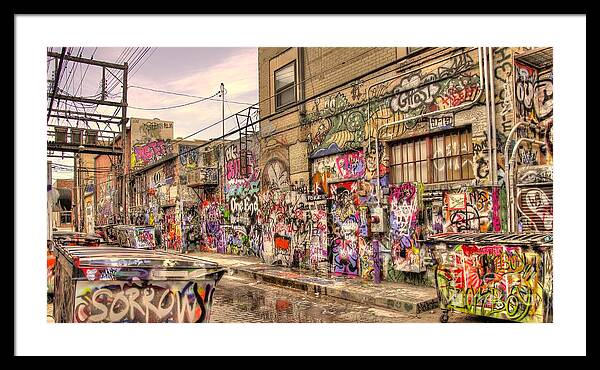 Graffiti Framed Print featuring the photograph Caution Wet Paint by Anthony Wilkening