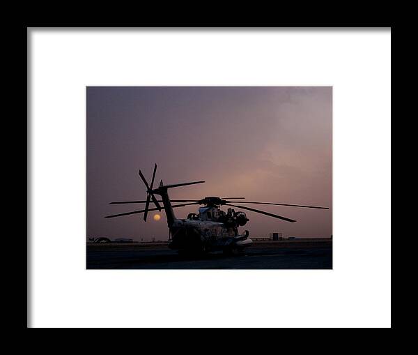 Afghanistan Framed Print featuring the photograph CH-53 at sunset in Afghanistan by Jetson Nguyen