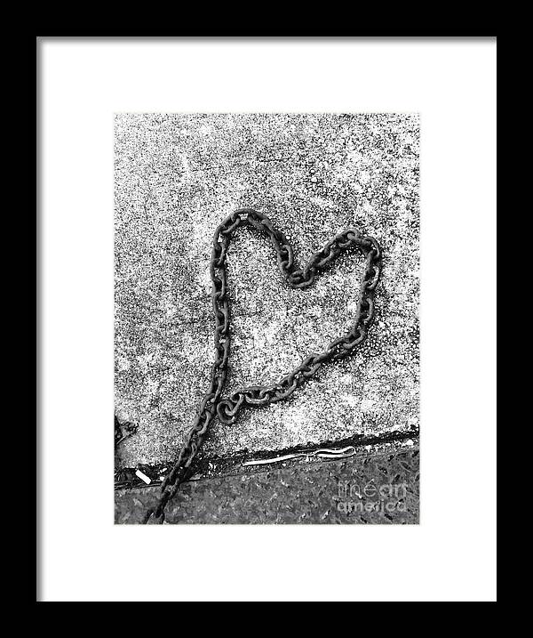 Chain Framed Print featuring the photograph Chained heart by WaLdEmAr BoRrErO