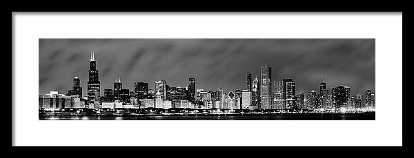 Chicago Skyline Framed Print featuring the photograph Chicago Skyline at Night in Black and White by Sebastian Musial