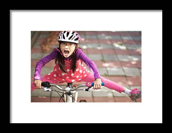 Asian And Indian Ethnicities Framed Print featuring the photograph Child with red polka dot dress by Joey Celis