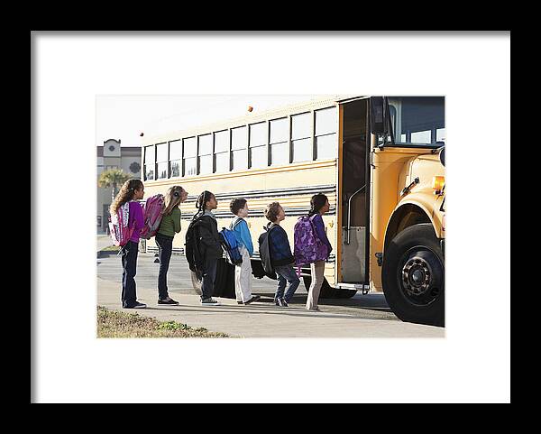 4-5 Years Framed Print featuring the photograph Children boarding school bus by Kali9