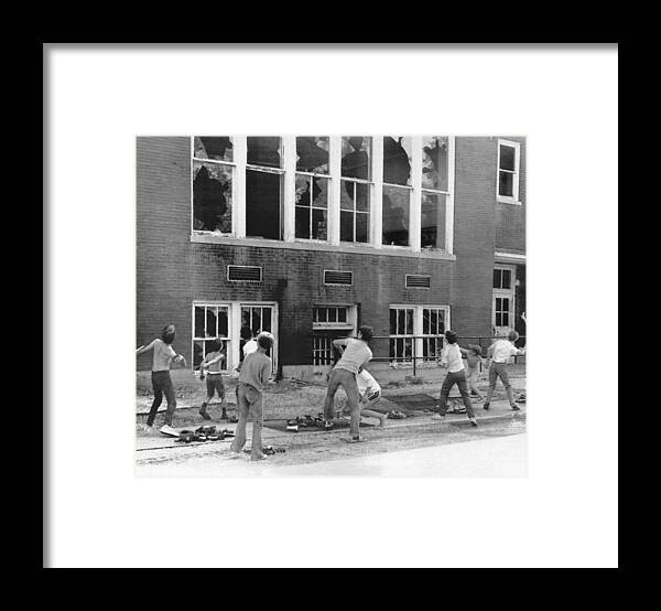 11-15 Years Framed Print featuring the photograph Children Breaking Windows by Underwood Archives