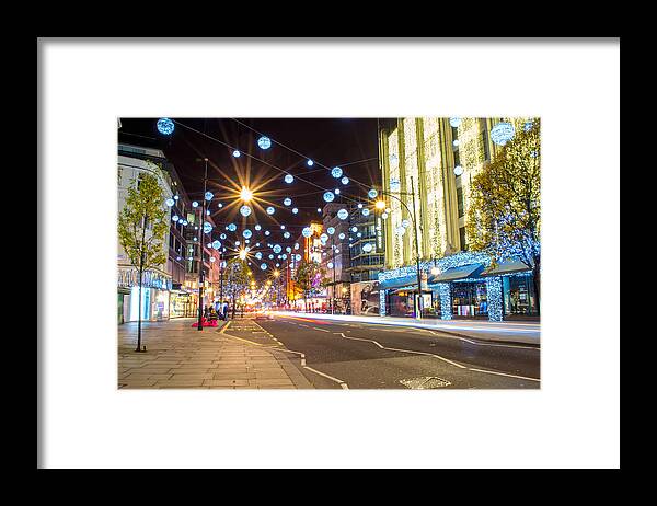 Christmas Framed Print featuring the photograph Christmas in Oxford Street by Andrew Lalchan