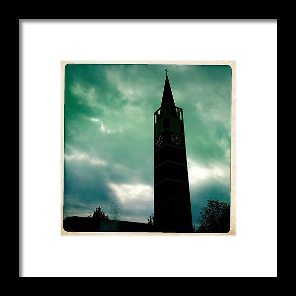 Church Framed Print featuring the photograph Church steeple and dark cloudy sky by Matthias Hauser