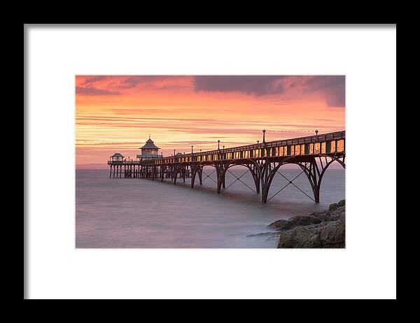 Clevedon Pier Framed Print featuring the photograph Clevedon Pier In Somerset, England by Nick Cable
