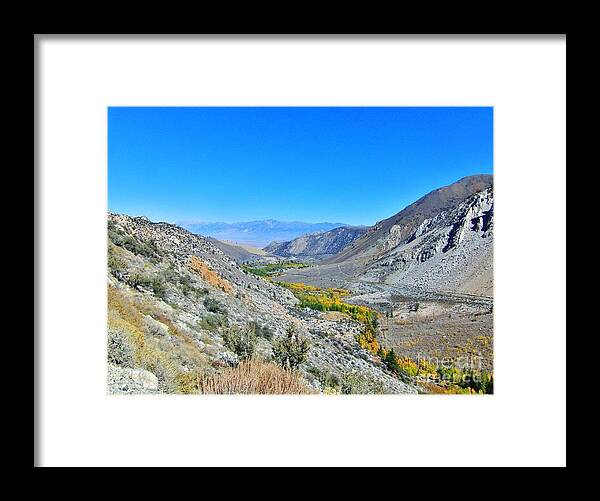 Sky Framed Print featuring the photograph Cliffside by Marilyn Diaz