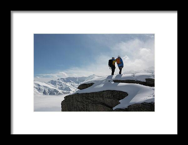 Expertise Framed Print featuring the photograph Climbers Stand On Snowy Mountain by Ascent Xmedia