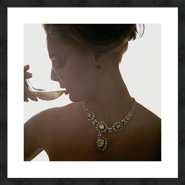Close Up Of A Young Woman Wearing Jewelry by Bert Stern