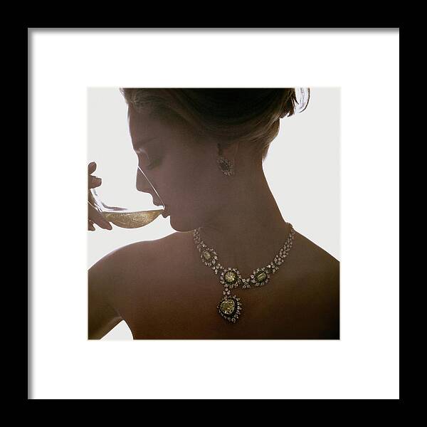 Jewelry Framed Print featuring the photograph Close Up Of A Young Woman Wearing Jewelry by Bert Stern
