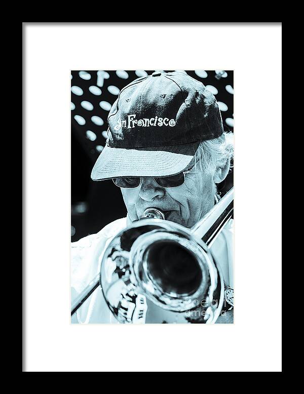 Brass Framed Print featuring the photograph Close Up Of Male Trombone Player In Baseball Cap by Peter Noyce