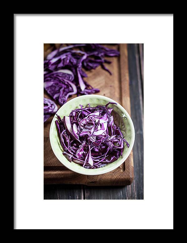 Cutting Board Framed Print featuring the photograph Close Up Of Sliced Red Cabbage On by Westend61