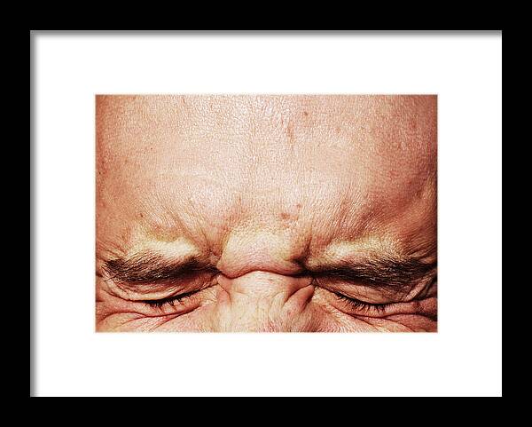 Ugliness Framed Print featuring the photograph Closed Eyes Squinting And Forehead by Amygdala_imagery