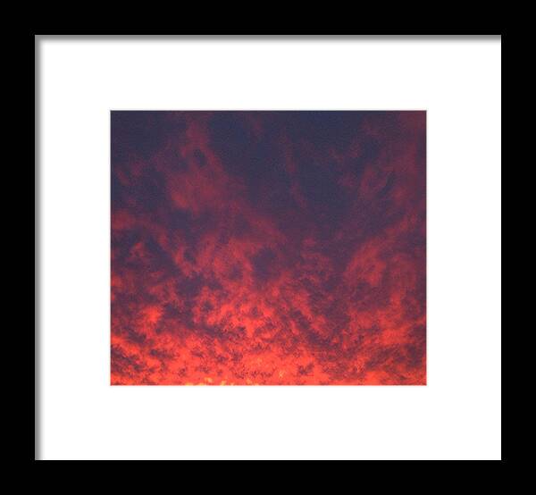 Clouds Framed Print featuring the photograph Clouds Ablaze by Marian Lonzetta