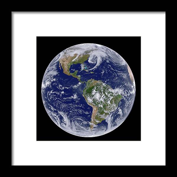 Earth Framed Print featuring the photograph Clouds Over The Americas by Nasa