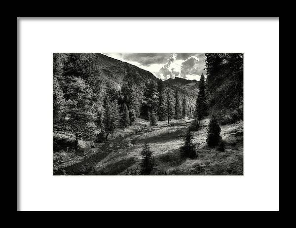 B&w Framed Print featuring the photograph Clouds over the mountainscape by Roberto Pagani