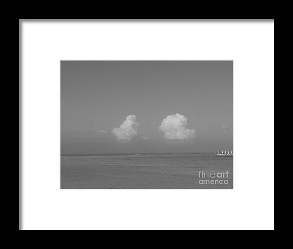 Clouds Framed Print featuring the photograph Clouds over the sea by Tiziana Maniezzo