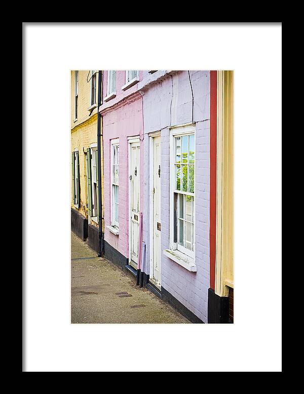 Blue Framed Print featuring the photograph Colorful cottages by Tom Gowanlock