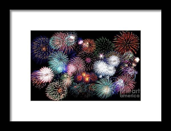 4th Framed Print featuring the photograph Colorful fireworks of various colors in night sky by Stephan Pietzko