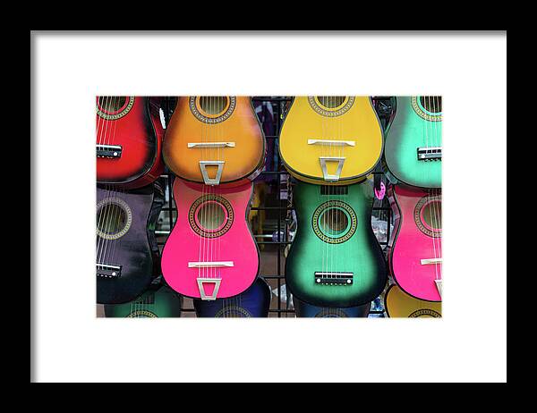 Hanging Framed Print featuring the photograph Colorful Mexican Guitars by Carol Wood