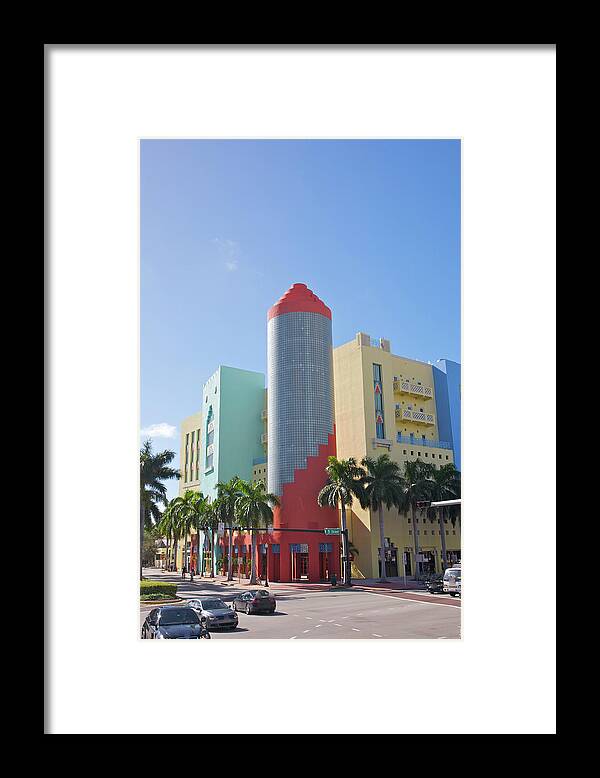Avenue Framed Print featuring the photograph Colorful Post Modern Building On Busy by Barry Winiker