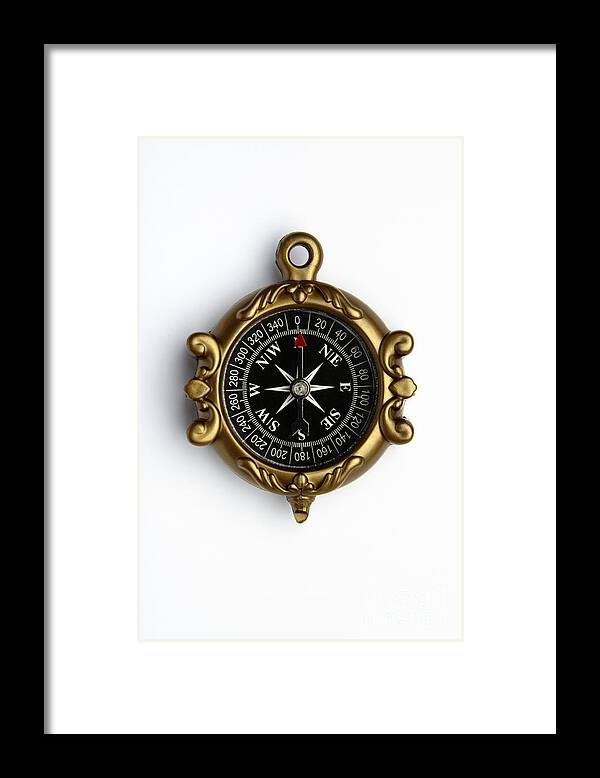 Compass Framed Print featuring the photograph Compass by GIPhotoStock
