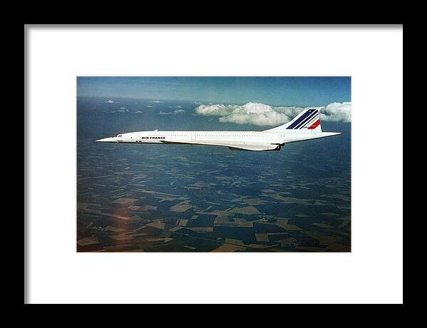 Concorde Framed Print featuring the photograph Concorde In Flight by Us National Archives