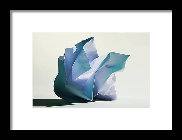 White Background Framed Print featuring the photograph Crumpled Ball Of Paper by Paul Taylor