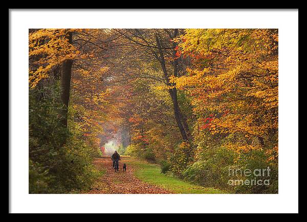 Michele Framed Print featuring the photograph Cyclist And Dog by Michele Steffey