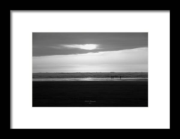 Ocean Framed Print featuring the photograph Dancing At Sunset In Black and White by Jeanette C Landstrom