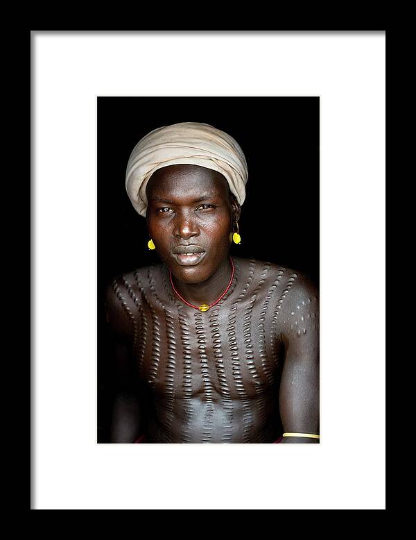African People Framed Print featuring the photograph Dassenech Man With Body Scarification by Tony Camacho