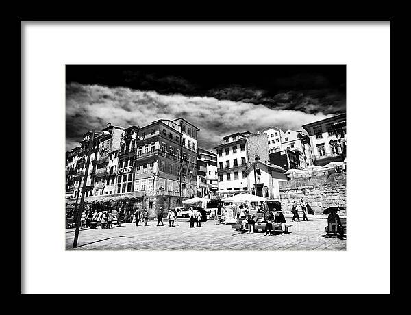 Day Walkers In Porto Framed Print featuring the photograph Day Walkers in Porto by John Rizzuto
