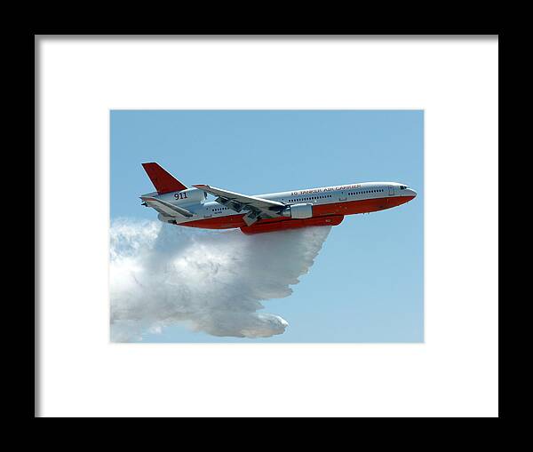 Dc 10 Fire Fighting Jet Framed Print featuring the photograph DC10 Aerial Tanker Dropping Water by Jeff Lowe